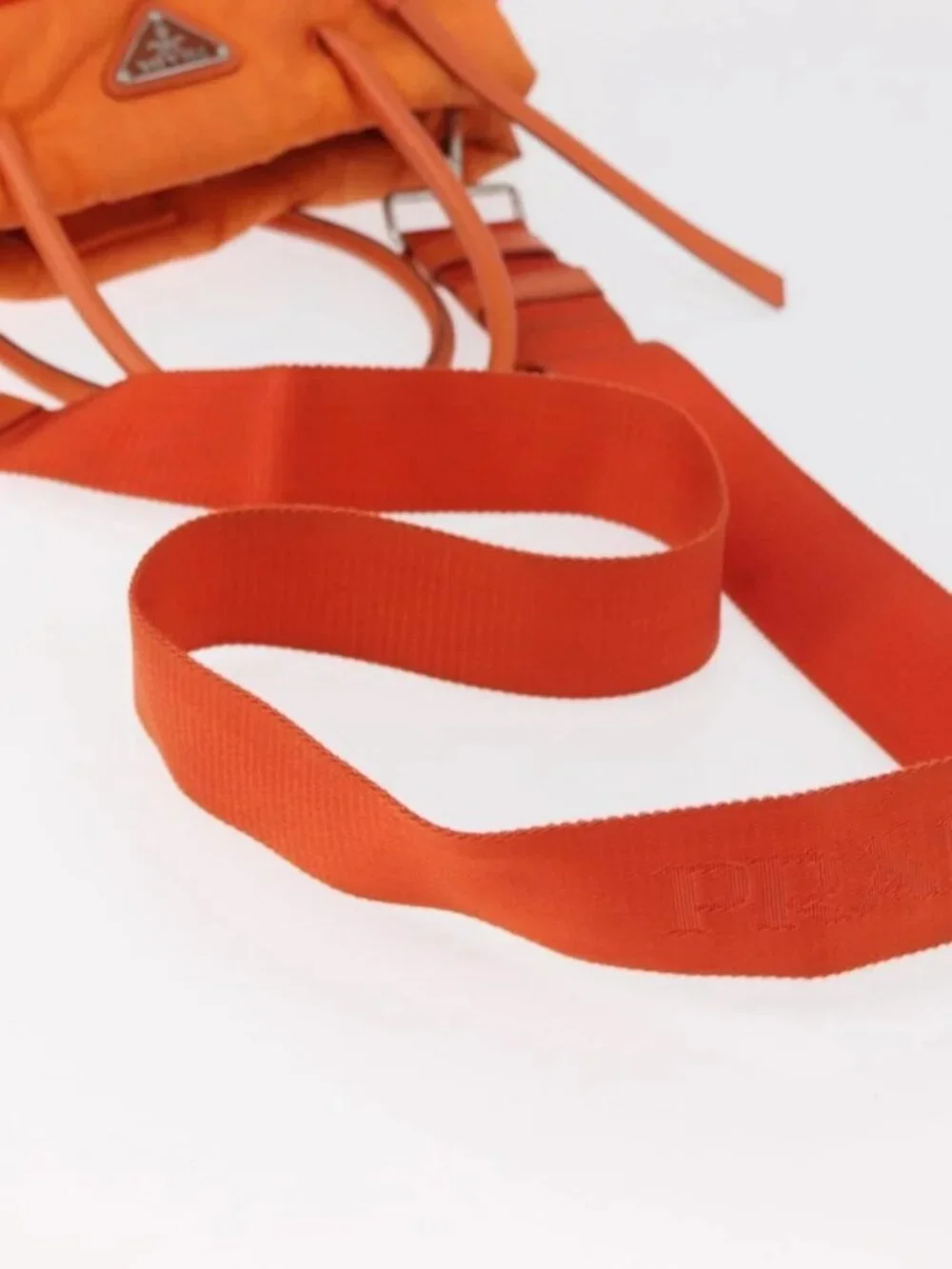 Prada brand	prada color	orange